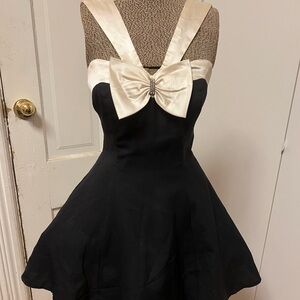 Vintage black dress with bow detail in front